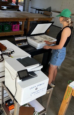 Figure 1: A student in the Technical Drawing course scanning on the mobile scanning cart.